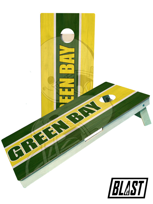 a green bay cornhole game on a white background