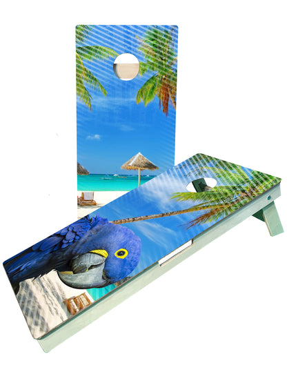 a cornhole game with a blue parrot on the beach