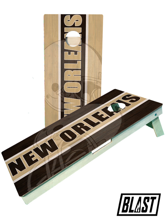 a new orleans cornhole board with the word new orleans on it