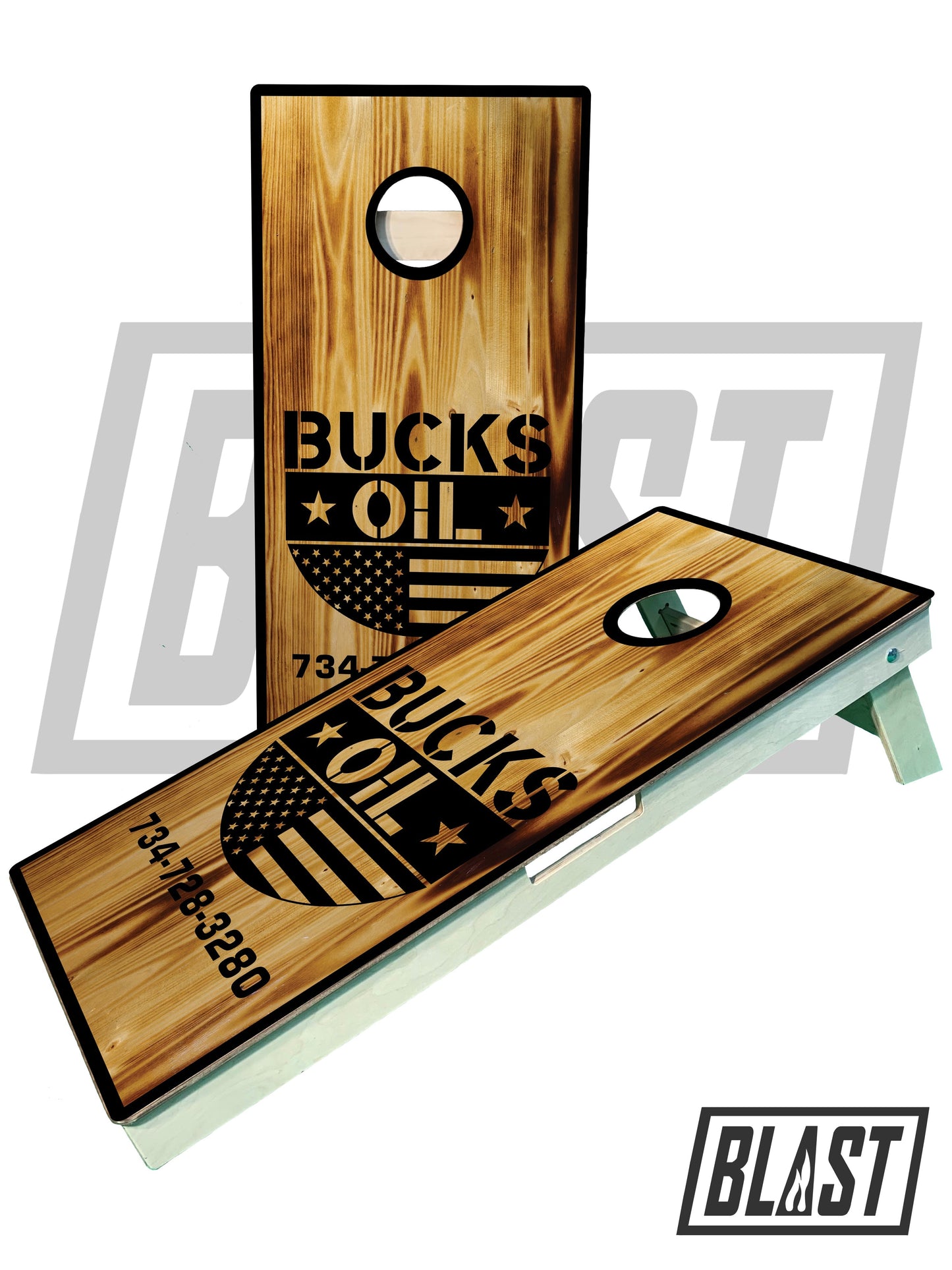 a pair of wooden cornhole tossers with the words bucks oil printed on them